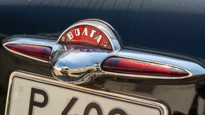 Image of the Volga logo on the rear of a car