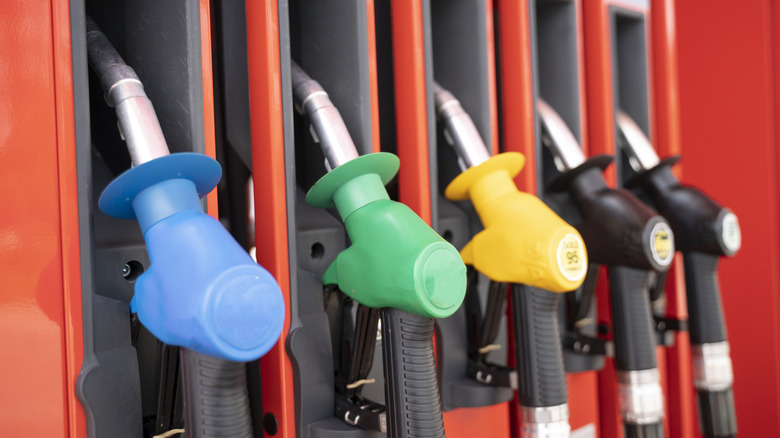 Close-Up Of Multi Colored Fuel Pumps