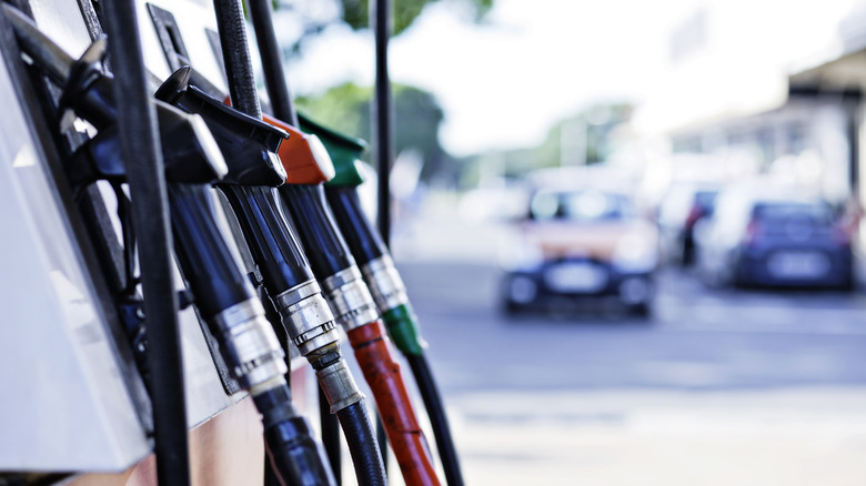 Gas station pumps with car approaching