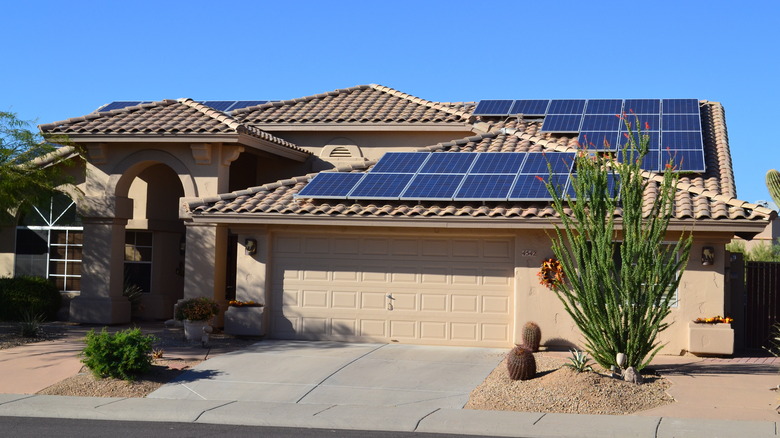 House with solar panels in desert climate