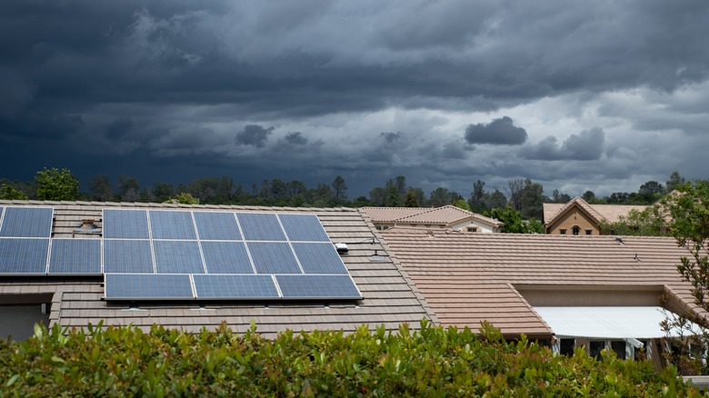 Solar panels on roof on gloomy day