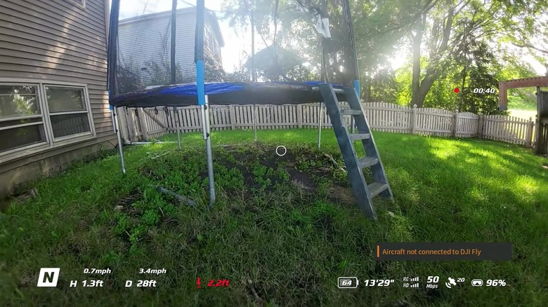 Drone flying under a trampoline