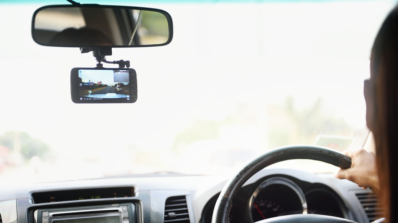 Dashcam attached under rearview mirror