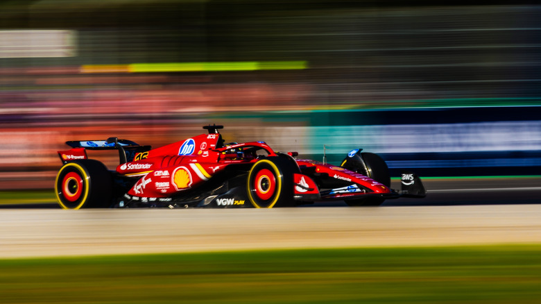 Charles Leclerc racing at 2024 Italian Grand Prix at Monza, right-front view, at racing speed