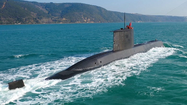 A submarine on the surface of the ocean