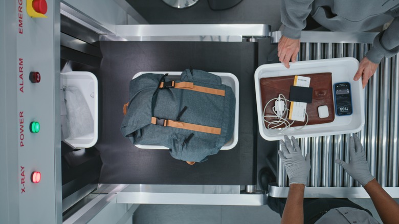 Bins going through TSA screening