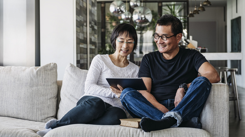 Couple looking at tablet