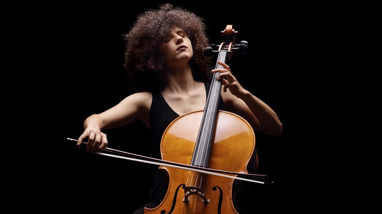 woman playing a cello