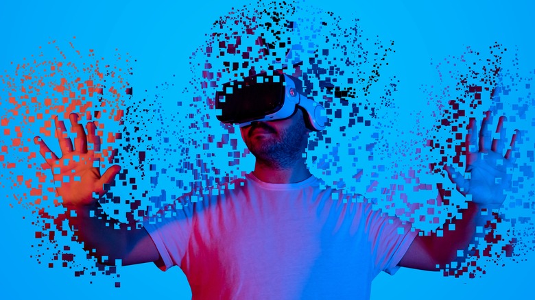 person in VR headset dissolving into pixels