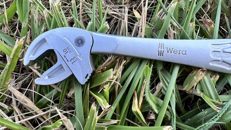 Self setting wrench sitting in the grass