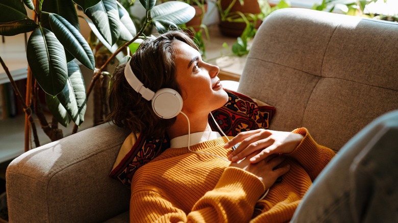 girl listening to headphones