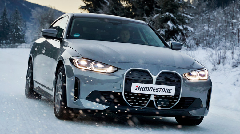 Front 3/4 view of BMW 4-Series Gran Coupe in snowy conditions