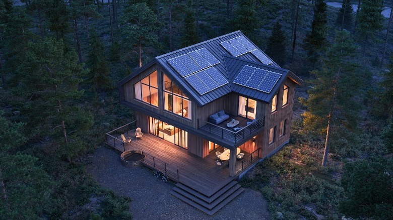 Nighttime house with solar panels