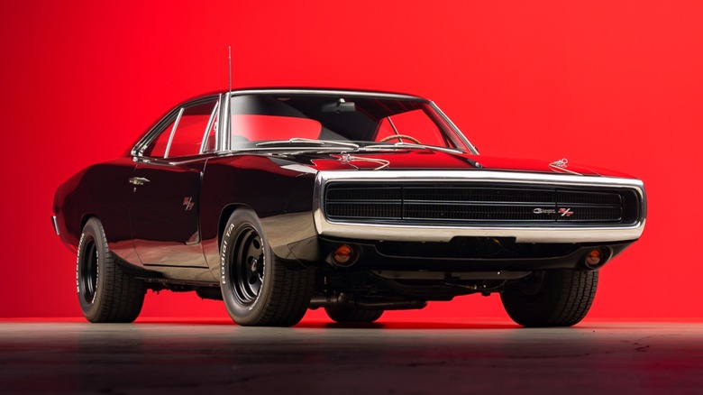 Black Dodge Charger R/T on red background