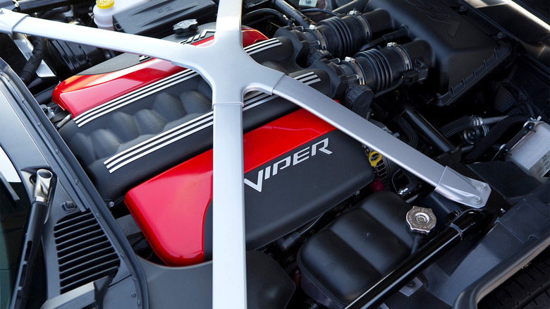 A Dodge Viper driving on a cloudy day