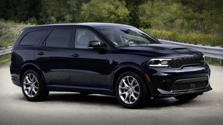 Black Dodge Durango Hellcat Hammerhead parked on road.