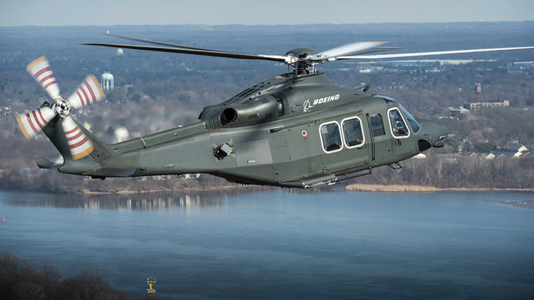 MH-139A hovering over a lake