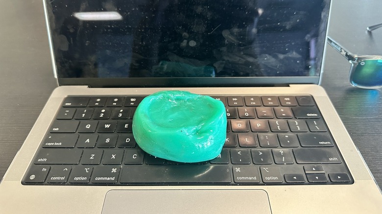 Dust cleaning gel sitting on top of Macbook Pro keyboard