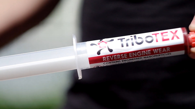 TriboTEX tube in person's hand