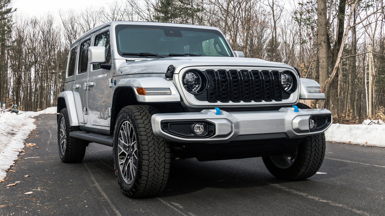 A Jeep 4xe in winter on a dry road