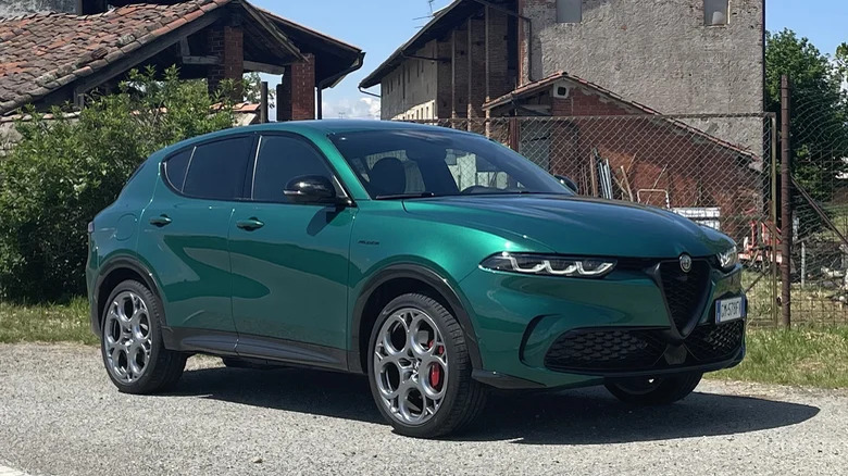 Green Alfa Romeo Tonale parked driveway