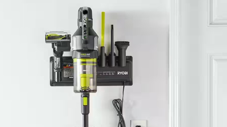 Ryobi Whisper stick vac with accessories and charger