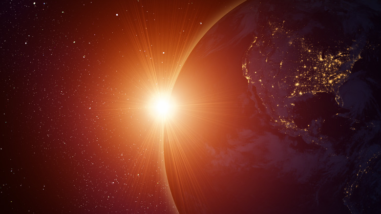 Illustration depicting Earth and Sun