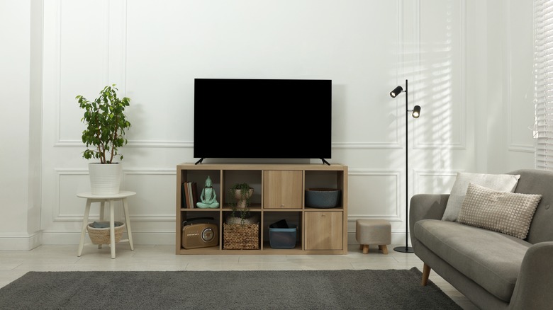 TV wall with console and decor