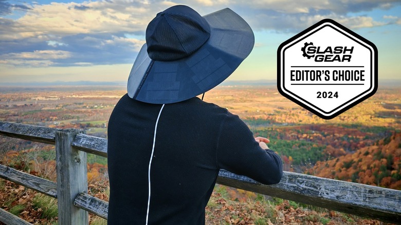 A man looking out over a valley while wearing the EcoFlow Power Hat