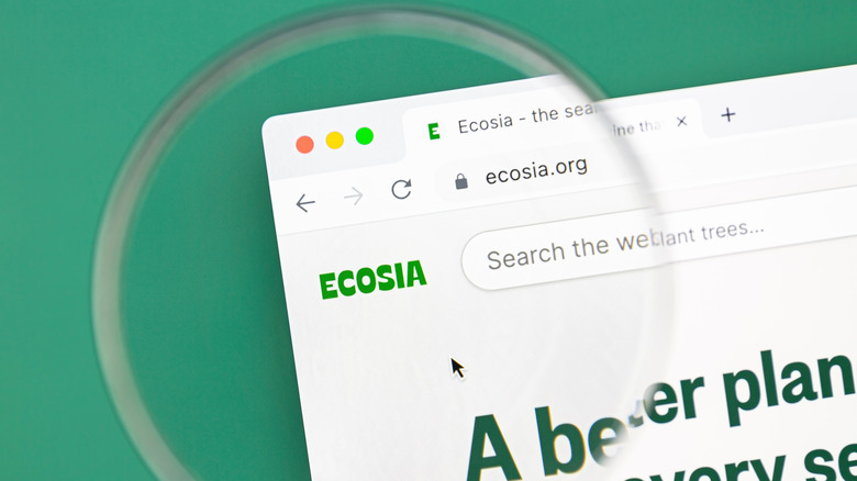 Ecosia search engine underneath a magnifying glass