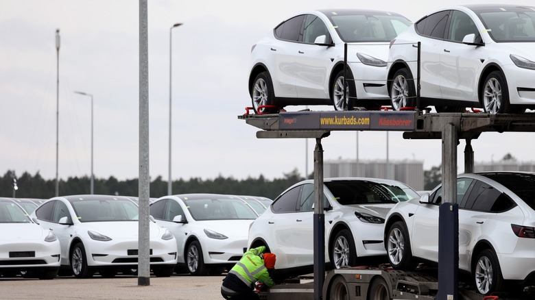 Tesla cars loaded for delivery