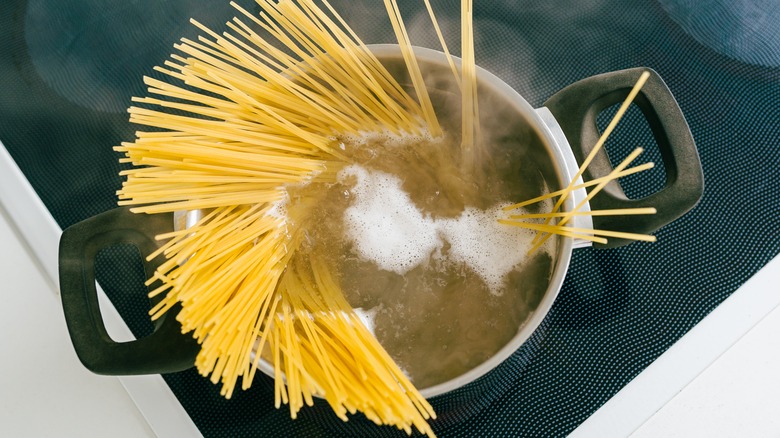 spaghetti in pot on stove