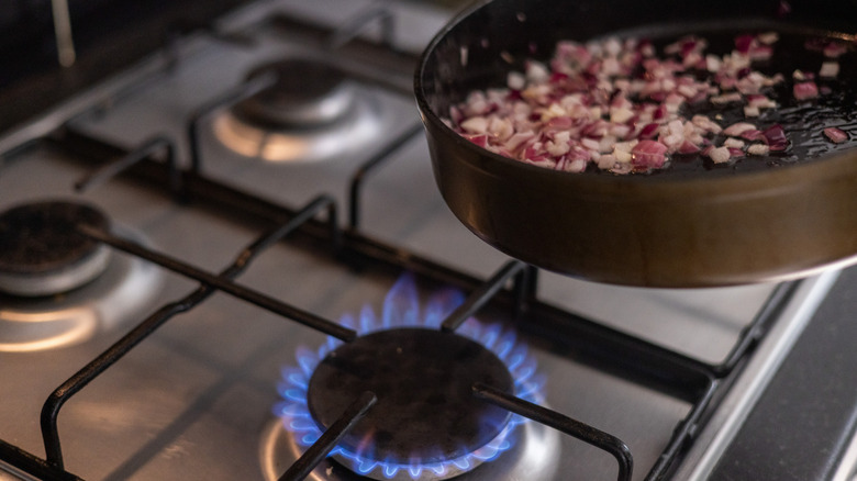 cooking onions on gas stove