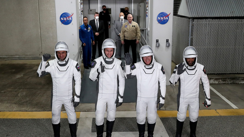 Astronauts boarding a SpaceX flight