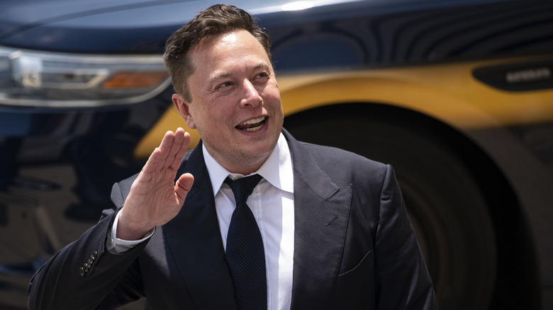 Elon Musk waving