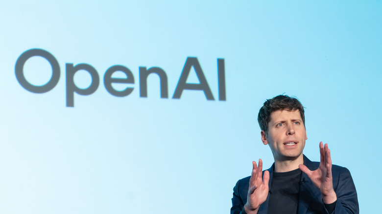 OpenAI CEO Sam Altman speaking on stage.