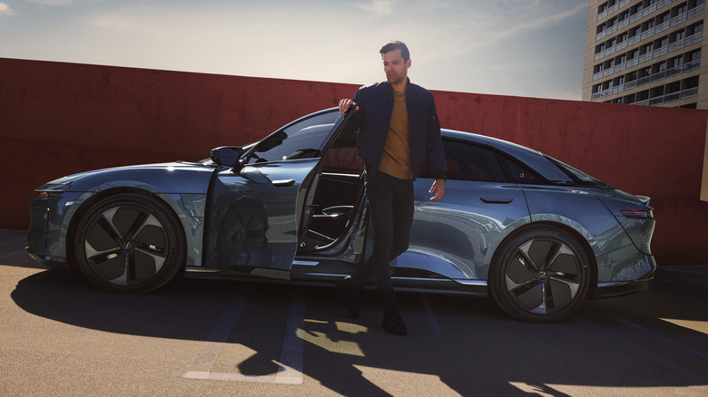 Person outside Lucid Air EV