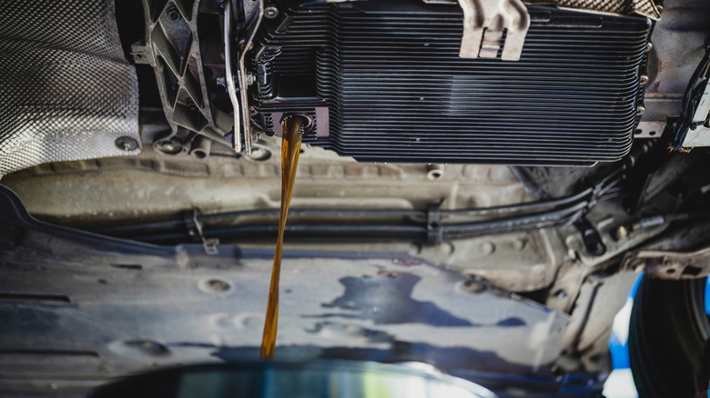 transmission fluid being poured