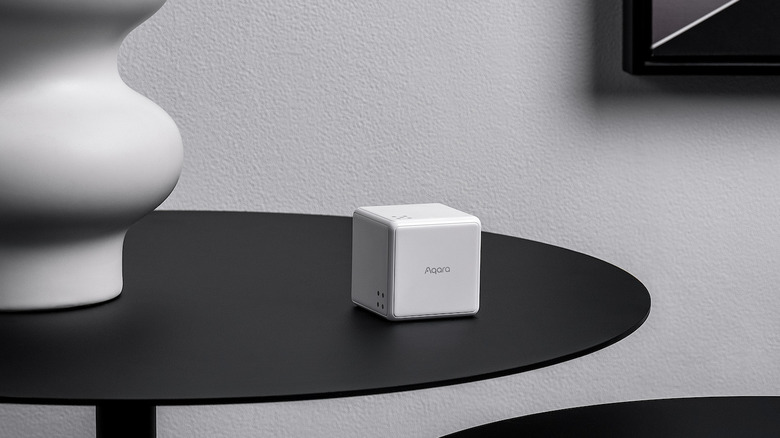 Aqara cube hub on modern decor table 