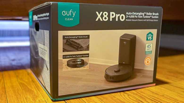 Eufy Clean X8 Pro box, with cat in background