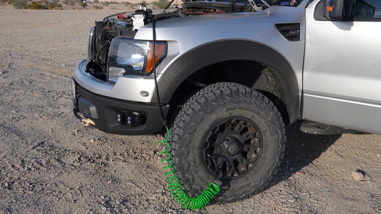 Heavy-duty tire inflator / portable air compressor used on Ford F-150 Raptor SVT off-road in the desert