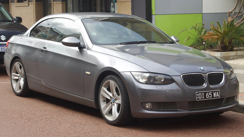 Silver 2008 BMW 335i convertible parked