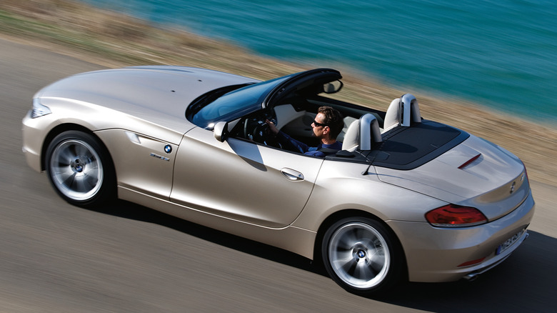 Champagne 2009 BMW Z4 driving with top down