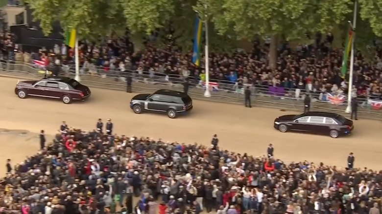 Jaguar XJ limousine in motorcade