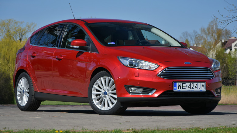 Red 2015 Ford Focus parked