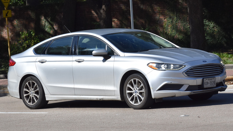 Silver Ford Fusion on the road