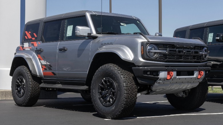 a Grey Ford Bronco Raptor SUV parked in a lot