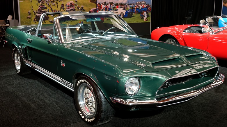 Green 1968 Ford Shelby Mustang Cobra GT500KR convertible at a car show