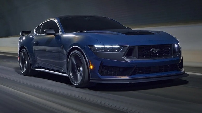 Ford Mustang Dark Horse driving on through tunnel