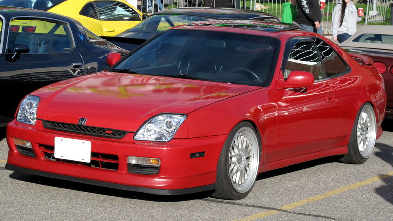 Red 5th generation Honda Prelude